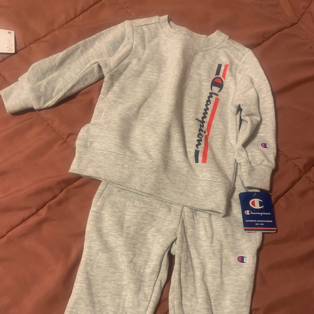 2 piece champions set size 24 months